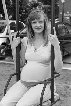 pregnant woman on swing