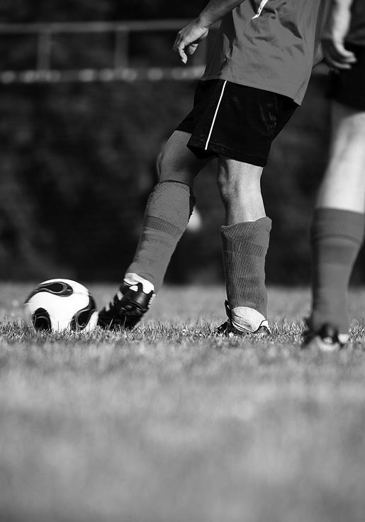 athletes playing soccer