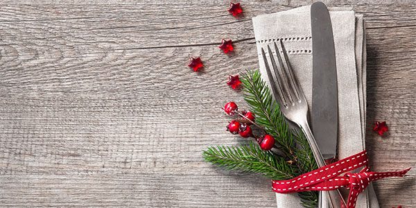 napkin with fork, ribbon, and berries